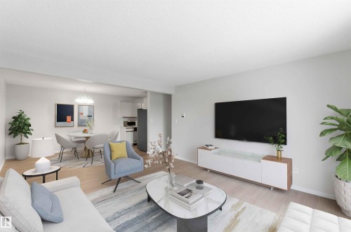 Open-concept living space with light wood-finish flooring - #304 4924 19 Av Nw, Edmonton, AB 