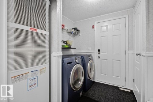 1073 Aspen Drive East, Leduc, AB - Indoor Photo Showing Laundry Room