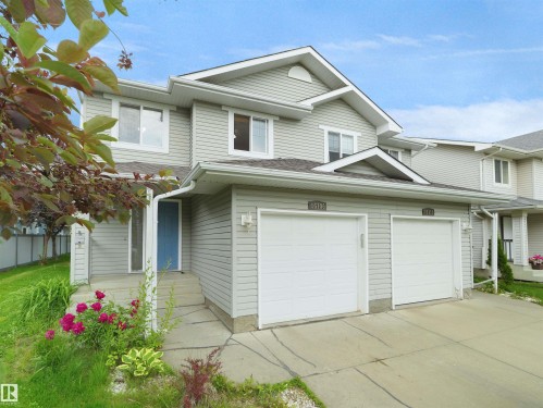 Two-story residence featuring light gray siding and white trim - 16106 131A Street, Edmonton, AB 