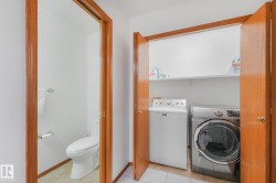Dedicated laundry area with shelving - 