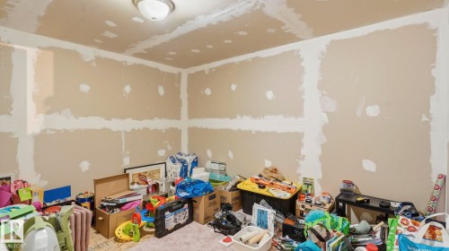 Interior room featuring unfinished drywall with taped and mudded seams - 1225 Kane Wynd, Edmonton, AB 