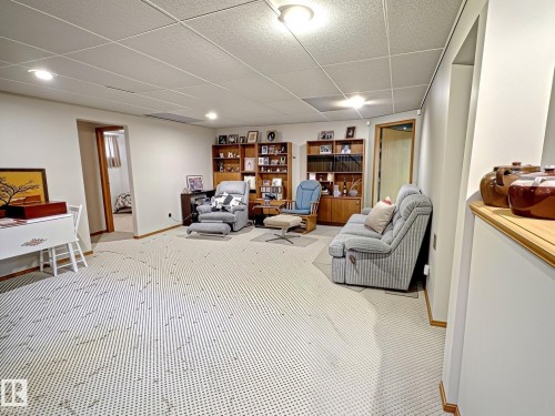 Spacious room featuring light-toned carpeting and white walls - 171 Rhatigan Road, Edmonton, AB 