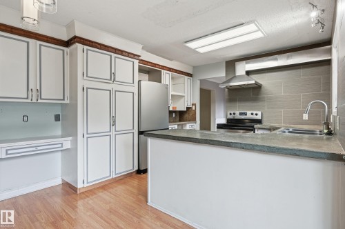 49 Pineridge Crescent, St. Albert, AB - Indoor Photo Showing Kitchen With Double Sink