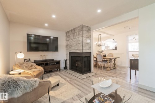 15 Grandin Wood(S), St. Albert, AB - Indoor Photo Showing Living Room With Fireplace