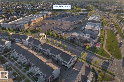 Aerial perspective of a multi-unit residential property situated in a developed suburban area - 140 655 Tamarack Road, Edmonton, AB 