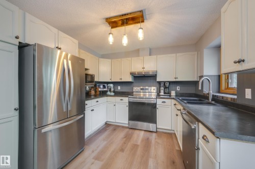 4810 42 Street, Beaumont, AB - Indoor Photo Showing Kitchen With Double Sink