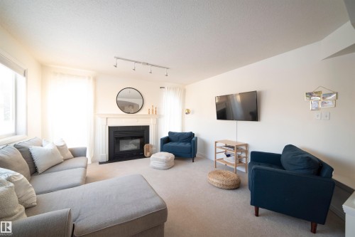 1417 115A Street, Edmonton, AB - Indoor Photo Showing Living Room With Fireplace