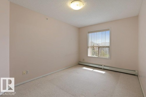 #412 9760 174 St Nw, Edmonton, AB - Indoor Photo Showing Other Room