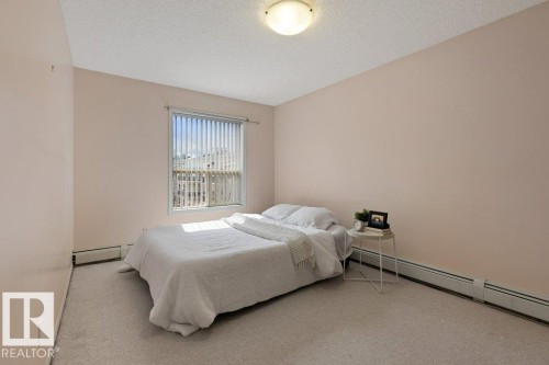 #412 9760 174 St Nw, Edmonton, AB - Indoor Photo Showing Bedroom