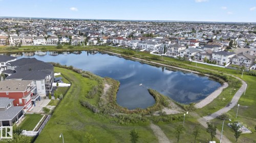 Water feature surrounded by residential properties, walking paths, and green spaces - 7858 170A Avenue, Edmonton, AB 