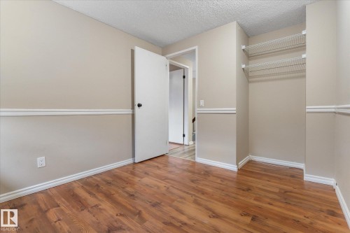 Neutral wall tones with chair rail molding - Fort Saskatchewan, AB 