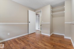 Neutral wall tones with chair rail molding - 