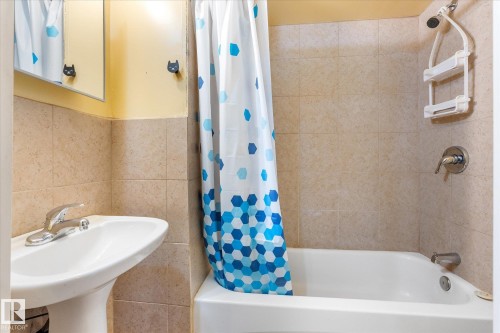 White pedestal sink with chrome faucet - Fort Saskatchewan, AB 