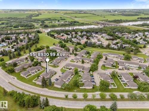 Aerial perspective showcasing a residential community with numerous detached properties - Fort Saskatchewan, AB 