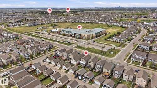 Expansive aerial view showcasing a developed residential neighborhood with a variety of detached homes - 445 Watt Boulevard, Edmonton, AB 