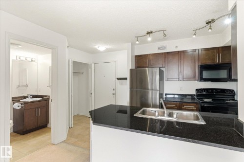 #409 11816 22 Av Sw, Edmonton, AB - Indoor Photo Showing Kitchen With Double Sink