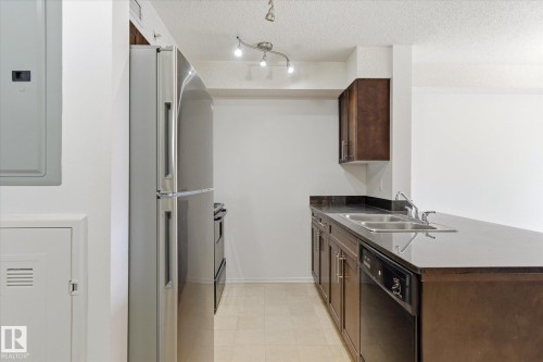 #409 11816 22 Av Sw, Edmonton, AB - Indoor Photo Showing Kitchen With Double Sink