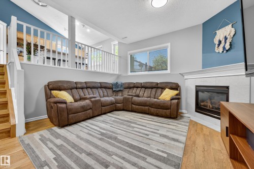 78 Bonin Crescent, Beaumont, AB - Indoor Photo Showing Living Room With Fireplace