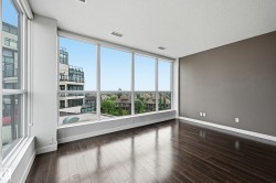 Floor-to-ceiling windows with expansive city and neighborhood scenery - 