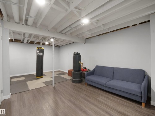 Finished lower level featuring wood-finish flooring and recessed lighting - 575 Dunluce Road, Edmonton, AB 