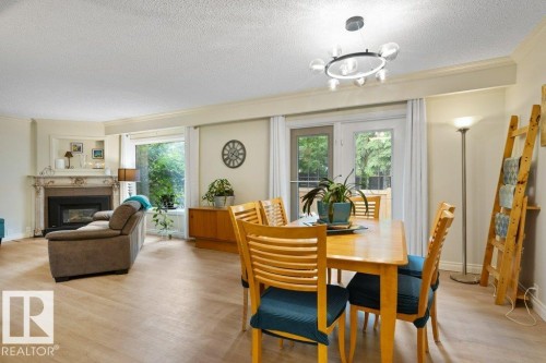 119 Grandin Woods Estates, St. Albert, AB - Indoor Photo Showing Other Room With Fireplace