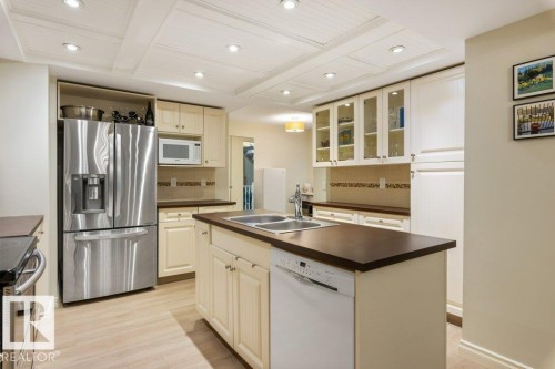 119 Grandin Woods Estates, St. Albert, AB - Indoor Photo Showing Kitchen With Double Sink