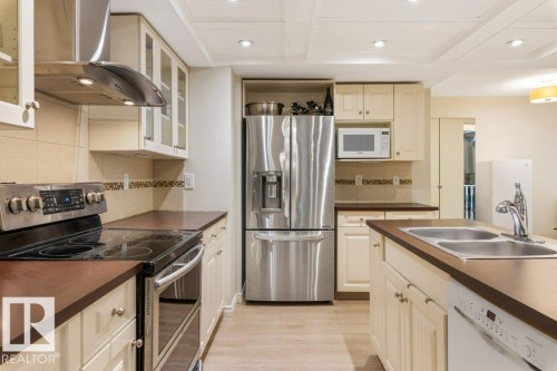119 Grandin Woods Estates, St. Albert, AB - Indoor Photo Showing Kitchen With Double Sink