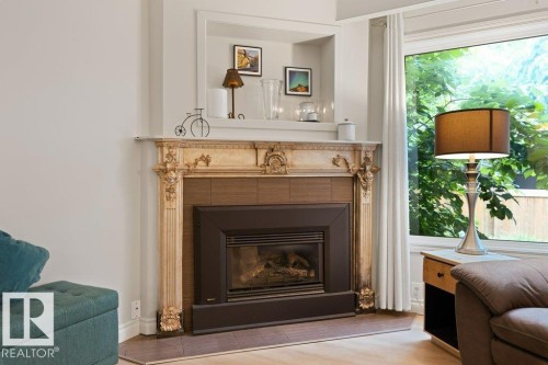 119 Grandin Woods Estates, St. Albert, AB - Indoor Photo Showing Living Room With Fireplace