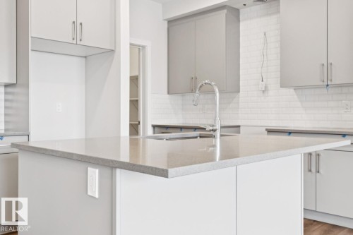 2482 Egret Loop Nw, Edmonton, AB - Indoor Photo Showing Kitchen With Double Sink With Upgraded Kitchen
