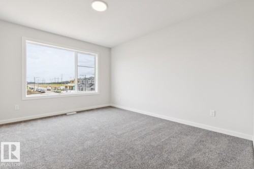 2482 Egret Loop Nw, Edmonton, AB - Indoor Photo Showing Other Room
