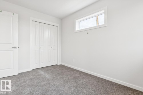 2482 Egret Loop Nw, Edmonton, AB - Indoor Photo Showing Other Room