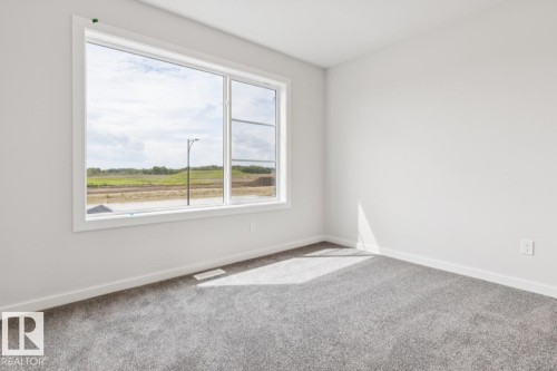2482 Egret Loop Nw, Edmonton, AB - Indoor Photo Showing Other Room