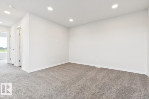 2482 Egret Loop Nw, Edmonton, AB - Indoor Photo Showing Other Room