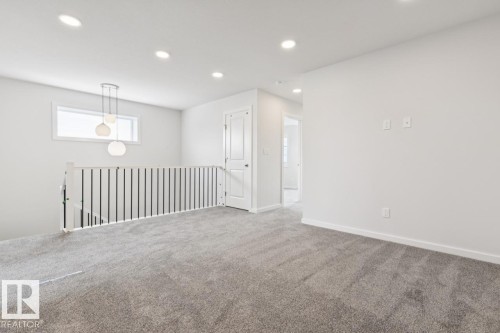 2482 Egret Loop Nw, Edmonton, AB - Indoor Photo Showing Other Room