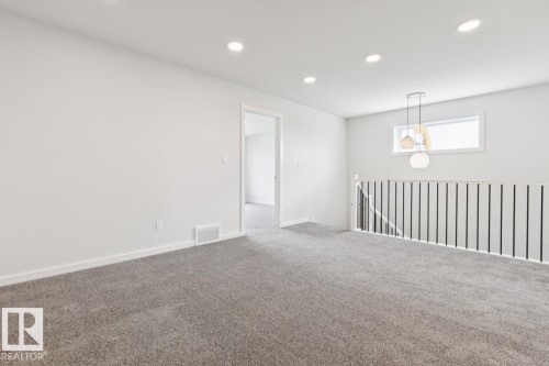 2482 Egret Loop Nw, Edmonton, AB - Indoor Photo Showing Other Room