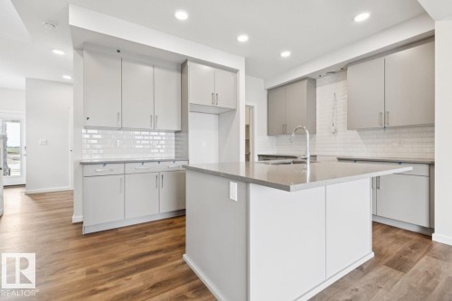 2482 Egret Loop Nw, Edmonton, AB - Indoor Photo Showing Kitchen With Upgraded Kitchen