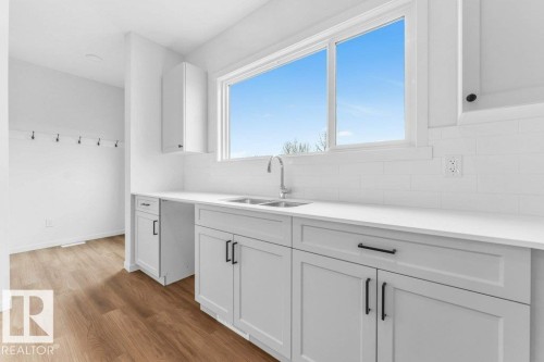 679 173 Avenue, Edmonton, AB - Indoor Photo Showing Kitchen With Double Sink