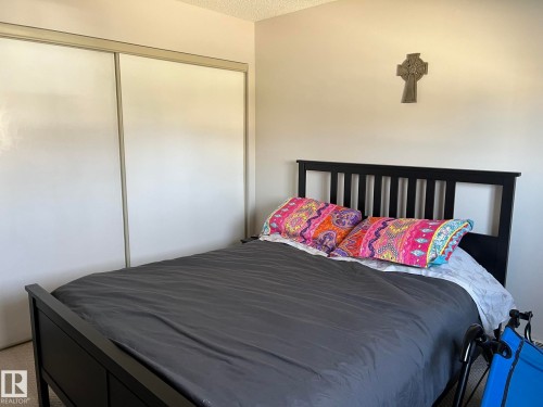 Room featuring wall-to-wall carpeting and neutral wall paint - 207 18012 95 Avenue, Edmonton, AB - Indoor Photo Showing Bedroom