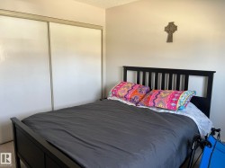 Room featuring wall-to-wall carpeting and neutral wall paint - 