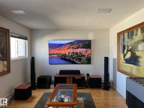 Hardwood-style flooring in a light finish - 207 18012 95 Avenue, Edmonton, AB - Indoor