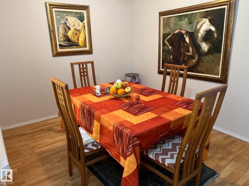 Hardwood flooring throughout - 207 18012 95 Avenue, Edmonton, AB - Indoor Photo Showing Dining Room