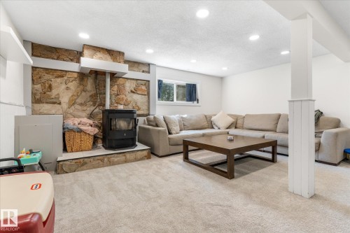 4009 37 Avenue, Leduc, AB - Indoor With Fireplace