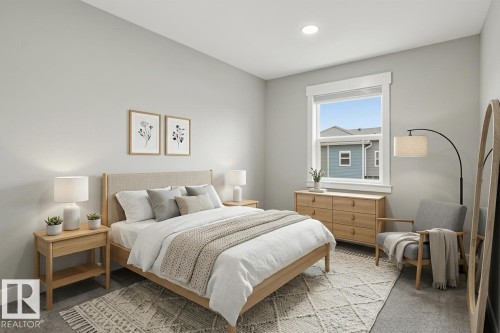 Light-filled room featuring a single window with white trim, recessed ceiling lighting, and soft gray wall color - 36 150 Everitt Dr, St. Albert, AB - Indoor Photo Showing Bedroom
