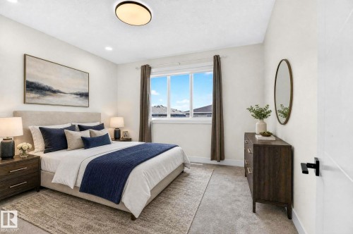 Room featuring neutral wall tones, white trim, and light grey carpet - 423 42 Street, Edmonton, AB 