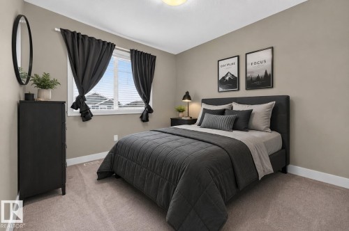 Virtually staged. - 186 Reed Place, Leduc, AB 