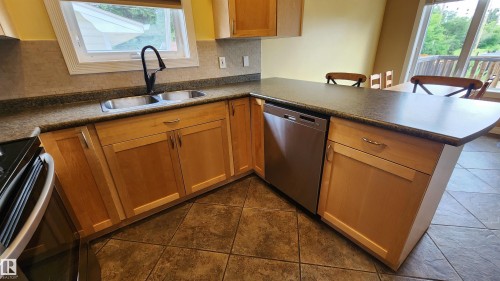 5110 50 Avenue, Elk Point, AB - Indoor Photo Showing Kitchen With Double Sink