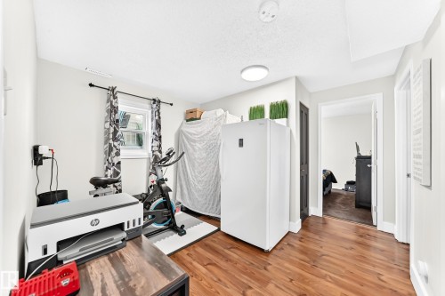 4228 114 Avenue Nw, Edmonton, AB - Indoor Photo Showing Gym Room