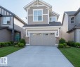 Contemporary two-story residence featuring siding and stone accents - 2635 Donaghey Crescent, Edmonton, AB 