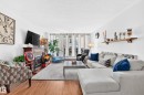 Living area featuring wood-finish Laminate flooring - #407 9835 113 St Nw, Edmonton, AB 