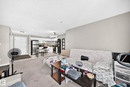 #221 5350 199 St Nw, Edmonton, AB - Indoor Photo Showing Living Room